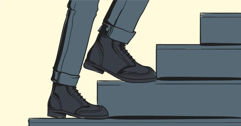 How Should Boots Fit? Your Guide to Perfect Fitting Boots 4 How Should Boots Fit Cartoon of man walking up stairs wearing boots and jeans FB